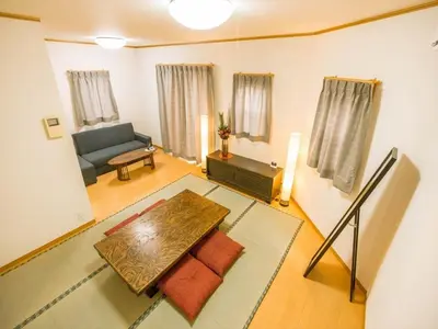 a living room with a couch and a table at Katsushika-ku - House / Vacation STAY 5375 in Tokyo