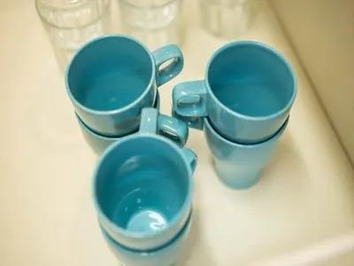 three blue cups sitting on top of a table at Katsushika-ku - House / Vacation STAY 5375 in Tokyo