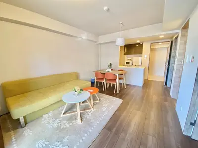 a living room with a couch and a table at Akasaka Residence in Tokyo