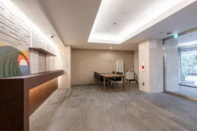 a dining room with a table and a window at Akasaka Residence in Tokyo