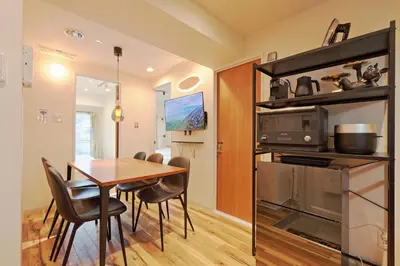 a kitchen and dining room with a table and chairs at V.Close to Shinjuku Kabukicho/Korean Town/FrWIFI D in Tokyo