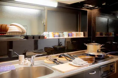 a kitchen with a sink and a counter top at HIRAI UTOPIA HOTEL in Tokyo