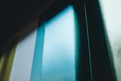 a close up of a green and white window at Hotel K5 in Tokyo