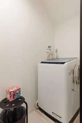 a white refrigerator in a kitchen with a box of cereal at Gracias Shibuya - Great Access to Shinjuku & Shibuya in Tokyo
