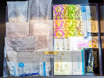a shelf filled with different types of products in plastic bags at Hotel Balian Resort Shinjuku Honten in Tokyo