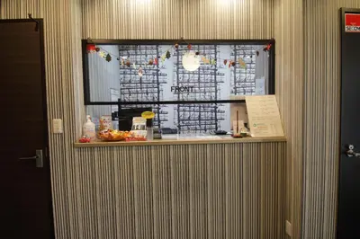 a window in a room with a food counter at Tokyo Tourist Inn in Tokyo