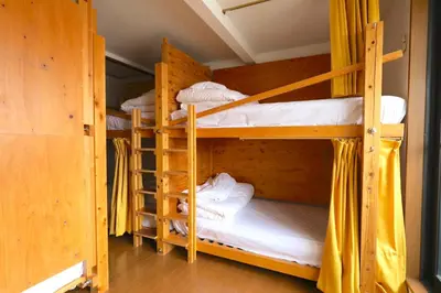a couple of bunk beds in a room at \u30b2\u30b9\u30c8\u30cf\u30a6\u30b9\u3077\u308c\u305c\u3093\u3068 in Tokyo