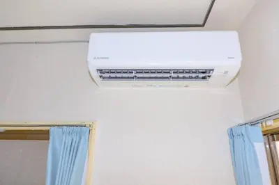 a air conditioner on the ceiling of a room at Cozy house \u845b\u98fe in Tokyo