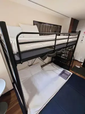 a couple of bunk beds in a room at 043AKIHABARA in Tokyo
