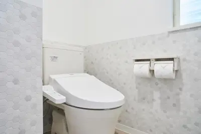 a bathroom with a white toilet in a room at Beautiful Villa in Shinjuku Shin-OKubo 6minutes walk B in Tokyo