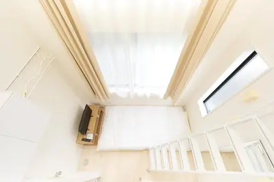 a room with a bed and a window at Nano Kita Shinjuku / Vacation STAY 62654 in Tokyo
