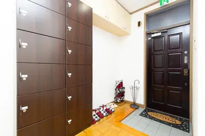a door leading into a room with christmas decorations at STATION SIDE113 in Tokyo