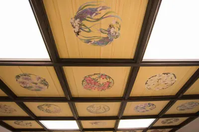 a ceiling with a painting of flowers on it at Shinjuku Miyabi Residence in Tokyo