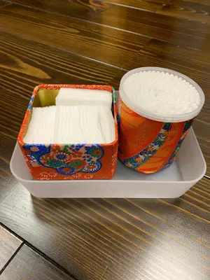 two containers of rice in a tray on a table at Shinjuku Miyabi Residence in Tokyo