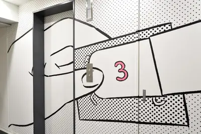 a wall with a door with a number on it at HOTEL TAVINOS ASAKUSA - Vacation STAY 64893 in Tokyo