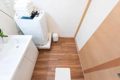 a small bathroom with a toilet and a sink at TORA HOTEL Tokyo Skytree \u5bc5\u30db\u30c6\u30eb \u30b9\u30ab\u30a4\u30c4\u30ea\u30fcF in Tokyo