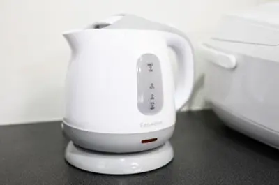 a white appliance sitting on top of a counter at Yahiro 4-chome House 2F,3F in Tokyo