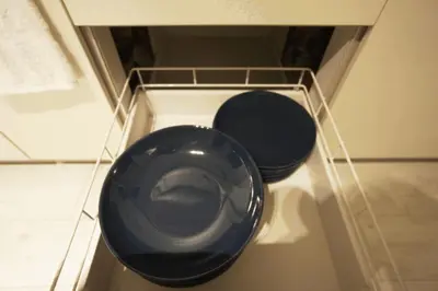 a blue toilet sitting in a shelf in a bathroom at H2O Stay Kikukawa Woody Sunheim #201 in Tokyo