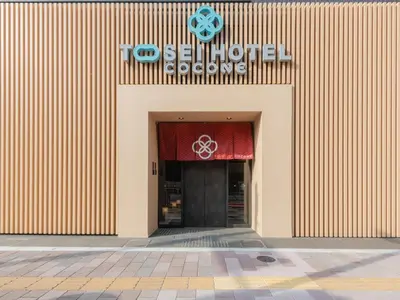 an entrance to a building with a sign on it at Tosei Hotel Cocone Asakusa Kuramae in Tokyo