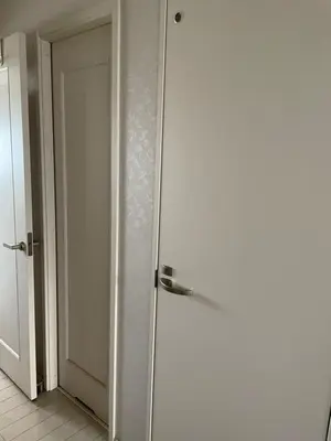 an open door to a room with a white door at Hostel 1010 TOKYO in Tokyo