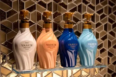 four bottles of wrath on a shelf in a wall at HOTEL VARKIN ANNEX in Tokyo