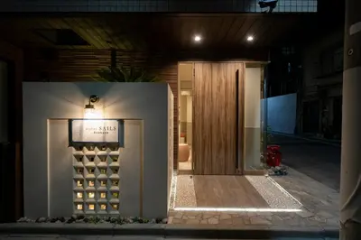 a front door of a wine cellar at night at Hotel SAILS Asakusa in Tokyo