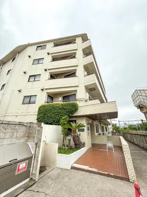 a apartment building with a patio in front of it at Eims stay Oomori206 in Tokyo