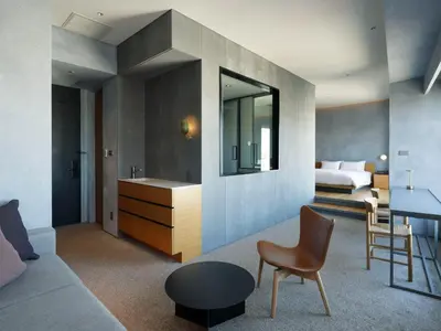 a hotel room with a bed and a bathroom at sequence MIYASHITA PARK - Shibuya in Tokyo