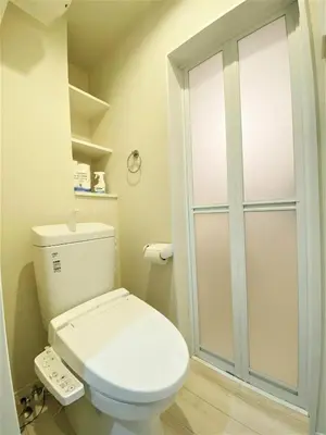 a bathroom with a toilet and a glass shower door at Shibuya-ku - Apartment / Vacation STAY 6219 in Tokyo