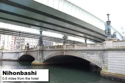 a bridge over a river with the words nicholson miles from the hotel at MONday Apart Premium Nihonbashi in Tokyo