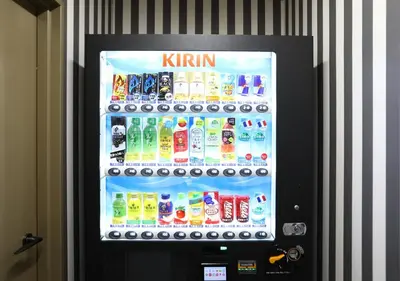 a vending machine filled with different types of drinks at APA Hotel Omori Ekimae in Tokyo