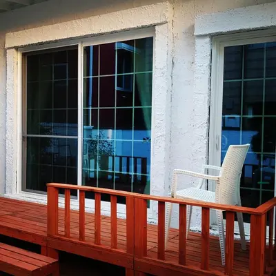 a porch with two chairs and a window at \u30db\u30c6\u30eb The Standard Apartment SHIBUYA SASAZUKA B\u30eb\u30fc\u30e0 in Tokyo