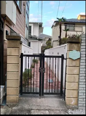 a gate to a building with a gate at \u30db\u30c6\u30eb The Standard Apartment SHIBUYA SASAZUKA B\u30eb\u30fc\u30e0 in Tokyo
