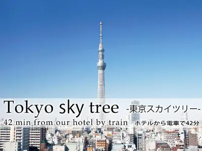 a tokyo sky tree with a city in the background at Hotel Abest Meguro / Vacation STAY 71390 in Tokyo