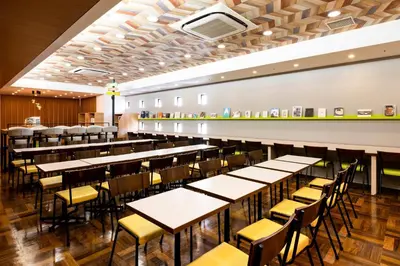 a large dining room with tables and chairs at Comfort Hotel Tokyo Higashi Nihombashi in Tokyo