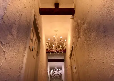 a hallway with a chandelier in a building at \u30db\u30c6\u30eb The Standard Apartment Shibuya D 2020\u5e74\u30aa\u30fc\u30d7\u30f3 in Tokyo