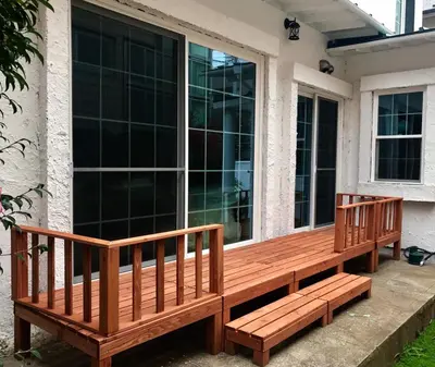two wooden benches sitting on the porch of a house at \u30db\u30c6\u30eb The Standard Apartment Shibuya D 2020\u5e74\u30aa\u30fc\u30d7\u30f3 in Tokyo