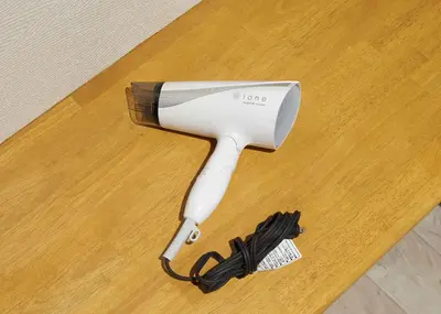 a hair dryer sitting on top of a table at IKIDANE Residential Hotel Sumida Kyojima in Tokyo