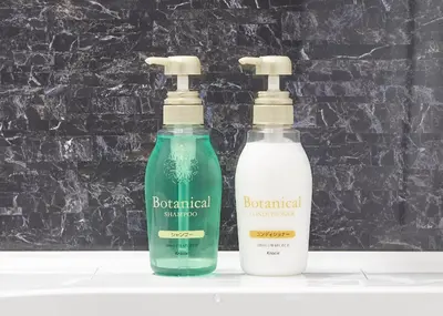 two bottles of detergent sitting on a shelf at IKIDANE Residential Hotel Sumida Kyojima in Tokyo