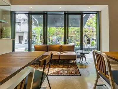 a living room with a couch and a table at Bay Hotel Tokyo Hamamatsucho in Tokyo