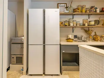 a large white refrigerator in a kitchen at Bay Hotel Tokyo Hamamatsucho in Tokyo