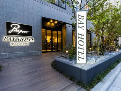 a building with a bay hotel sign in front of it at Bay Hotel Tokyo Hamamatsucho in Tokyo