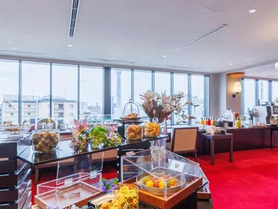 a hotel lobby with a buffet with food on display at Asakusa View Hotel Annex Rokku in Tokyo