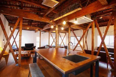 a kitchen with a sink in the middle of a room at \uff35\uff27\uff2f in Tokyo