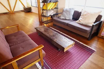 a living room with a couch and a coffee table at \uff35\uff27\uff2f in Tokyo