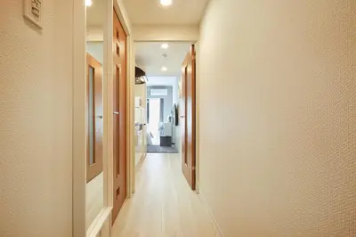 a hallway leading to a bathroom in a house at P OIN T - Shinjuku Kabukicho Designer's Apartment II in Tokyo