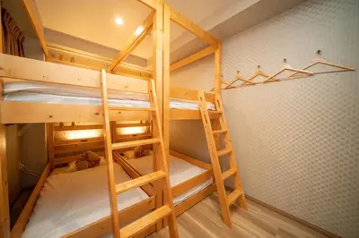 a couple of bunk beds in a room at kaguya asakusa Women only guest house in Tokyo