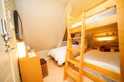 a bunk bed room with two bunk beds in it at kaguya asakusa Women only guest house in Tokyo
