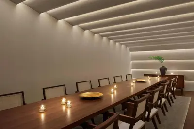 a dining room with a long table and chairs at The Tokyo EDITION, Toranomon in Tokyo