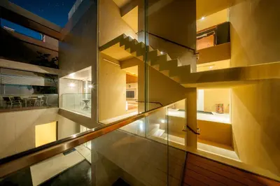 a house with a staircase in a room at Azabu Modern House The Tokyo Tower can be seen from the villa 500m2 in Tokyo